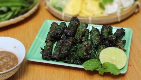 Grilled beef wrapped in lolot leaves