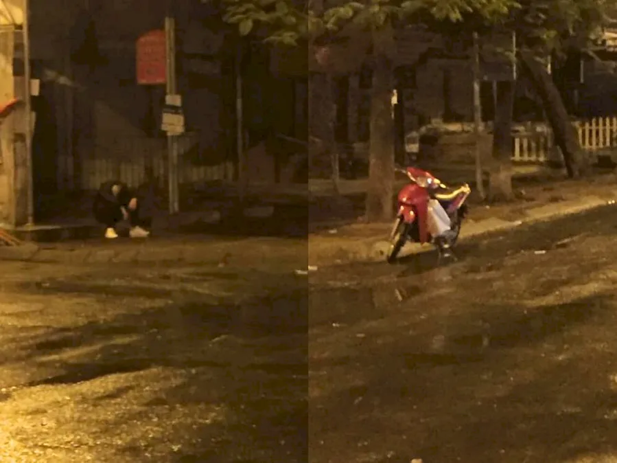 Heartbroken Young Man Sits Crying in the Middle of the Road Before Dawn